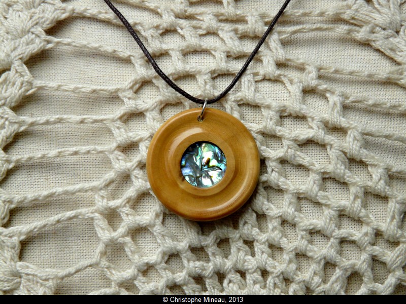 Pendant made of  Boxwood inlaid with Paua