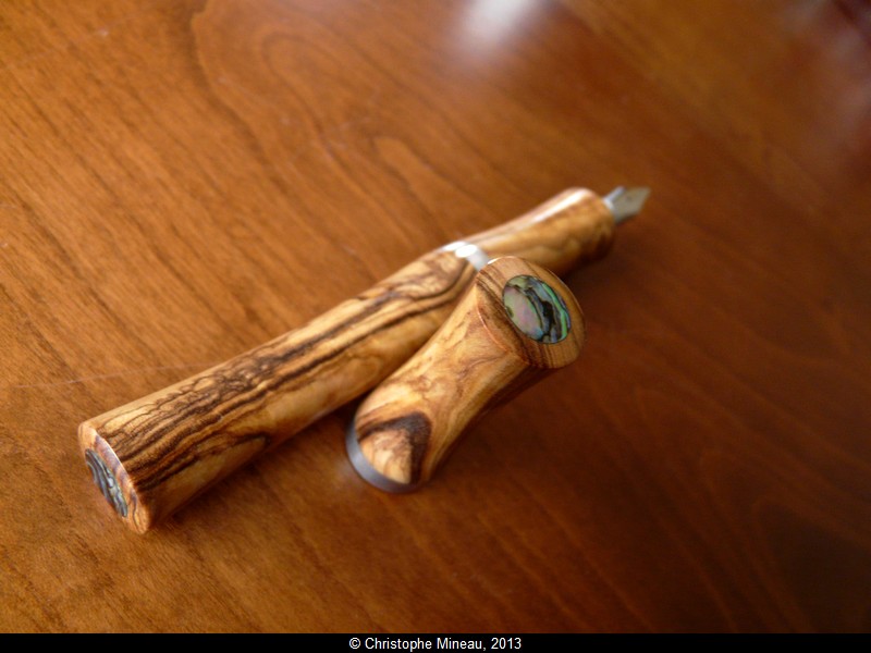 Fountain pen, made of olive wood from Bethlehem, and paua pearl. Kitless pen.