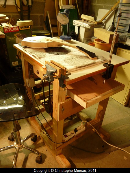 The thickness sander, while not used, transforms to a gluing table, in the center of my workshop.