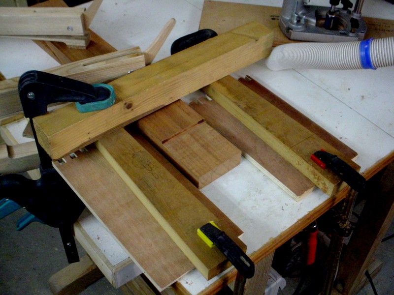 Routing of the tenon, parallel to the fingerboard.