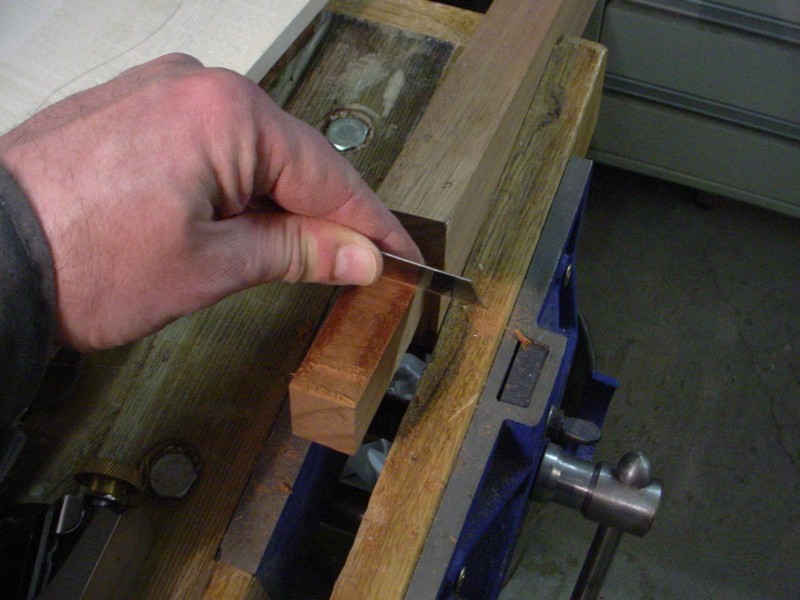 Adjusting thecut with a scaper.
