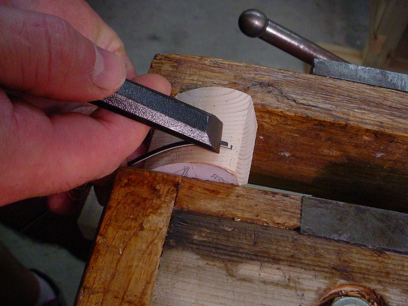 The bevel is cut with a chisel.