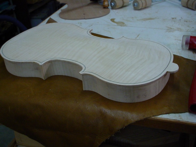 The back on the rim, not yet glued on.