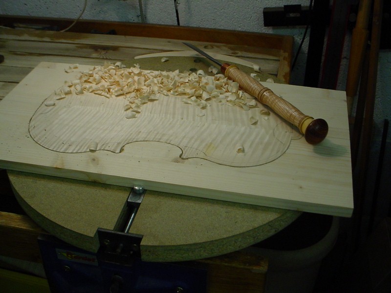 Starting the hollowing. Rough carving with the two handed gouge.