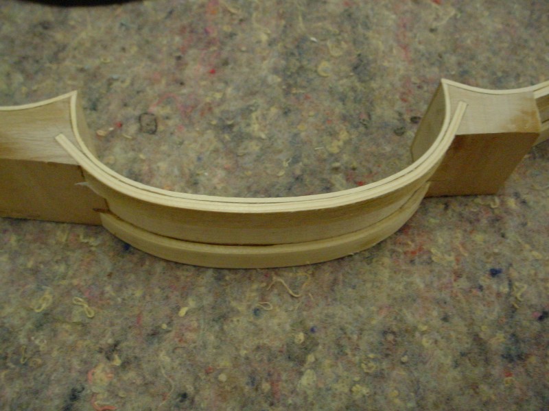 The linings are  glued on and leveled flush to the ribs. In the C part they are inlaid in the corners.
