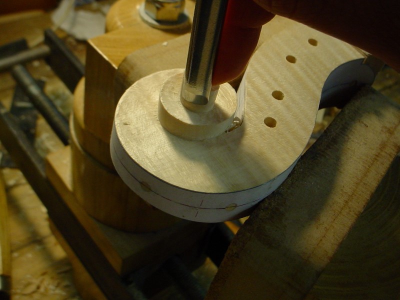 The inside corner is neatly cut using gouges with different radius.