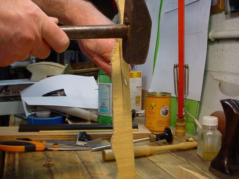 The wood is split in order to get a perfectly straight grain.