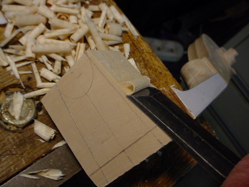 Shaping the sides of the heel.