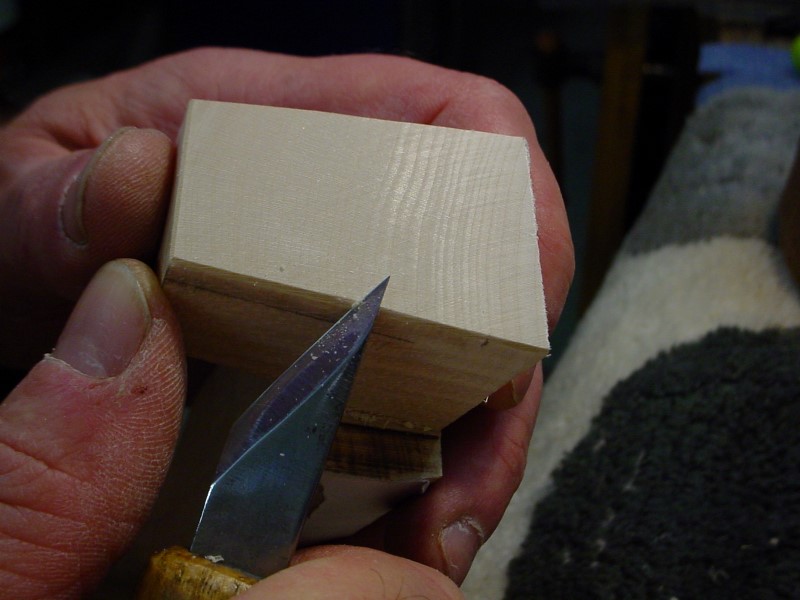 Light chamfer on the angles at the bottom of the mortise.