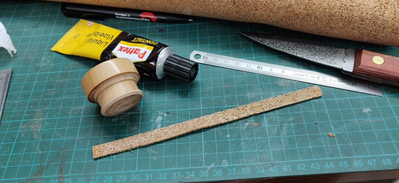 A groove is provided to accommodate the cork strip.