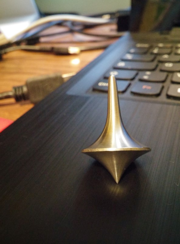Metal Spinning Top, like in Ithe movie Inception